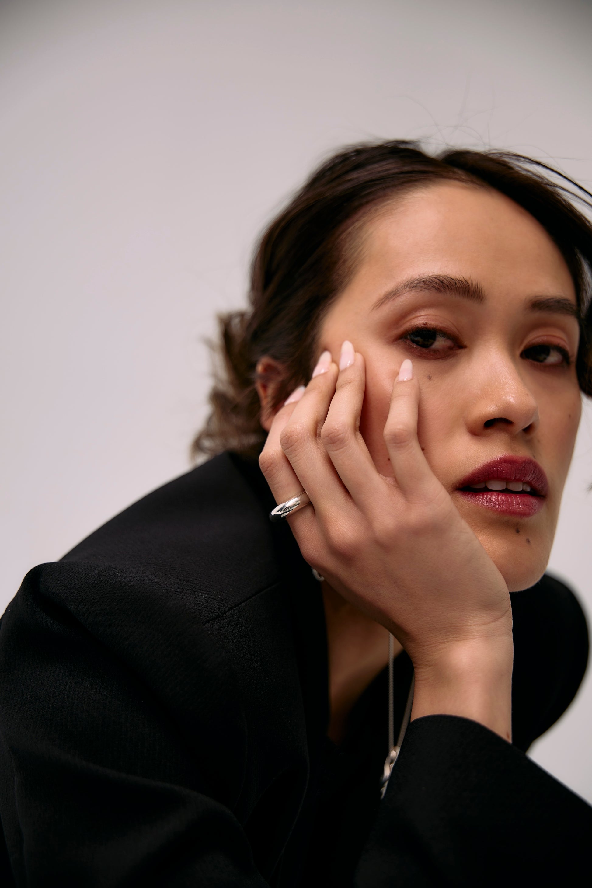 Side view of sculptural silver Astrid ring, handmade with a smooth finish and mirror polished by Seola Atelier