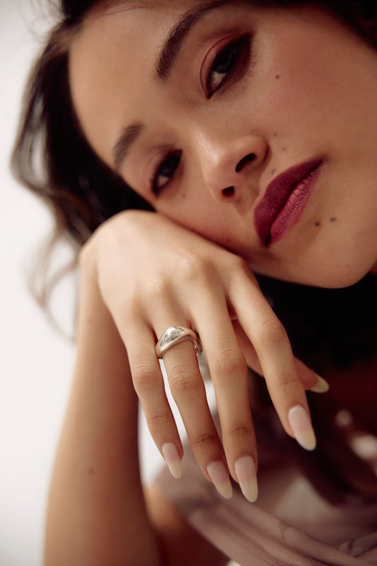 Clara ring by SÉOLA Atelier, handcrafted in textured sterling silver, photographed close up so you can see the shape