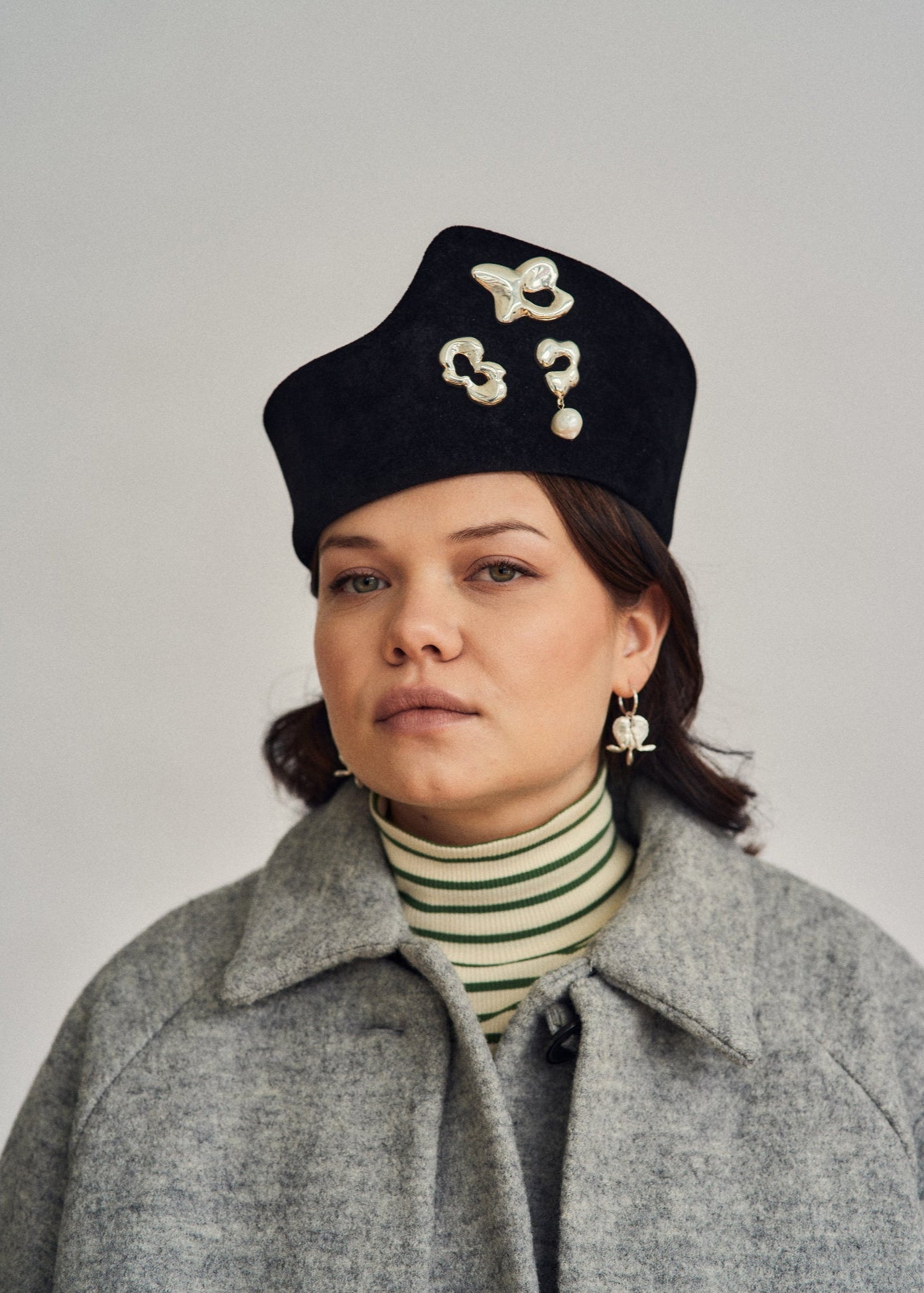 organic silver brooches styled on wool coat modern minimalist look by seola atelier