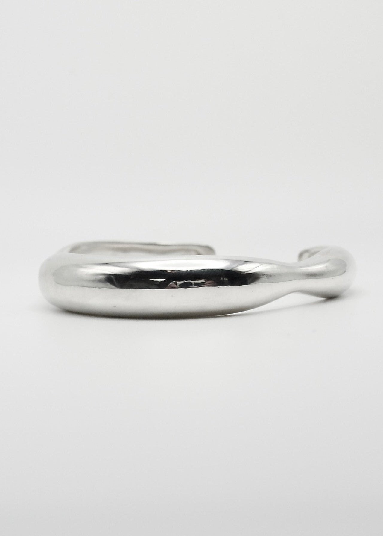 Detailed view of the Agnes Bracelet, focusing on its high-quality 925 sterling silver craftsmanship and reflective surface.