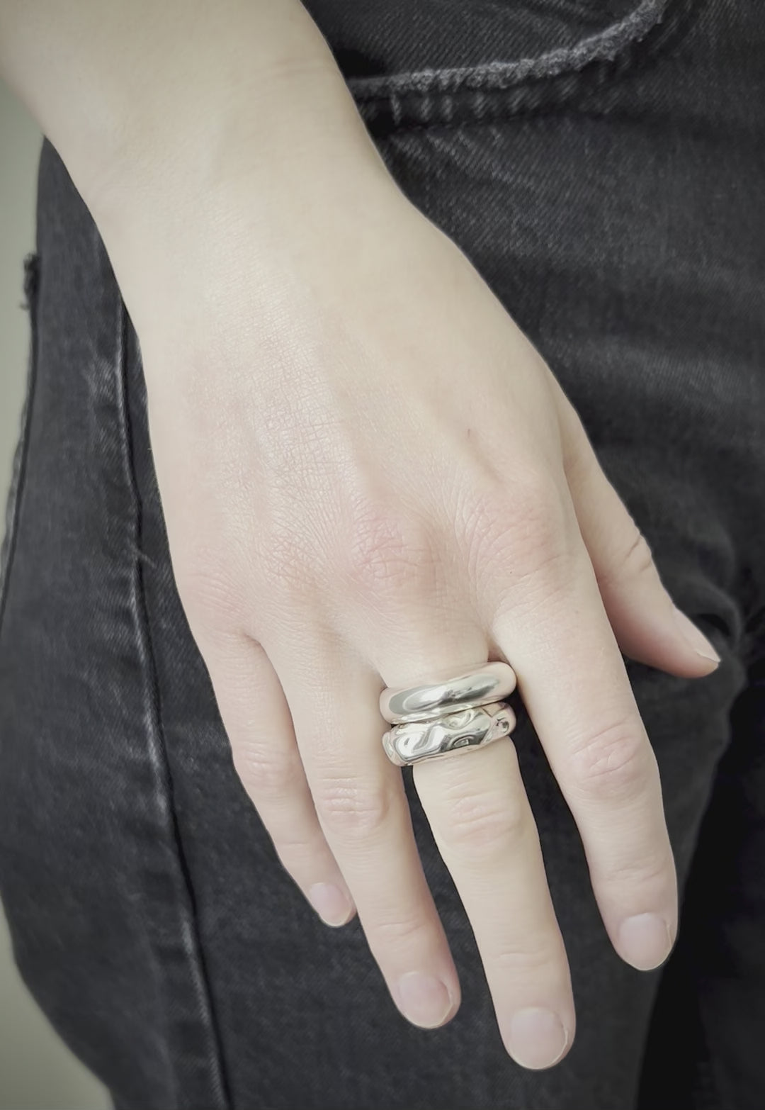 Astrid_ring_925_sterling_silver_simple_ring_organic_shape_ sister ring, model pouring water, stacking rings, playing violin, violin, silver rings