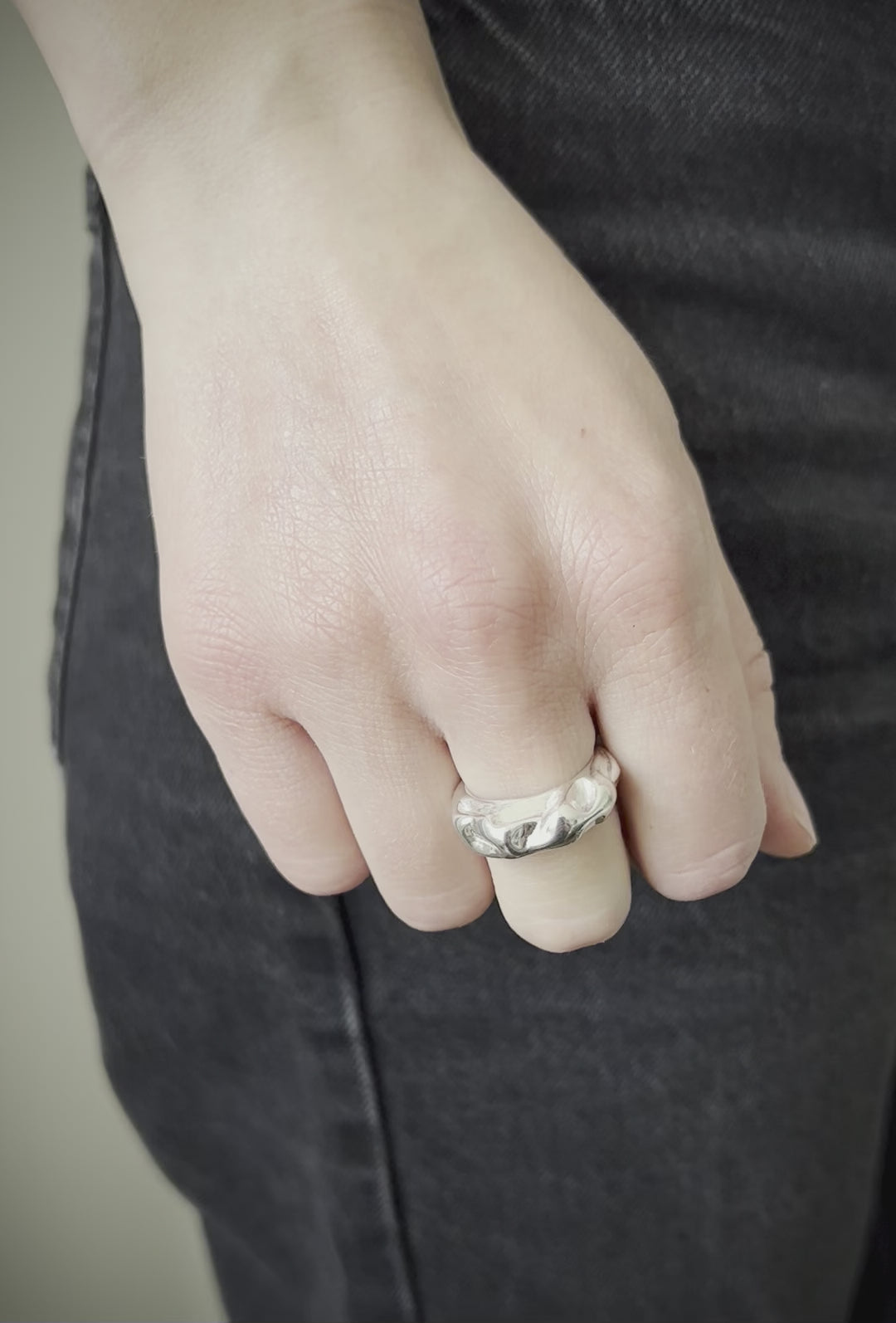 Esther_ring_Seola_Atelier_925_sterling_silver_statement_ring_organic_ring_on_model_wedding, stacking ring, sterling silver, model with orange, stacking rings