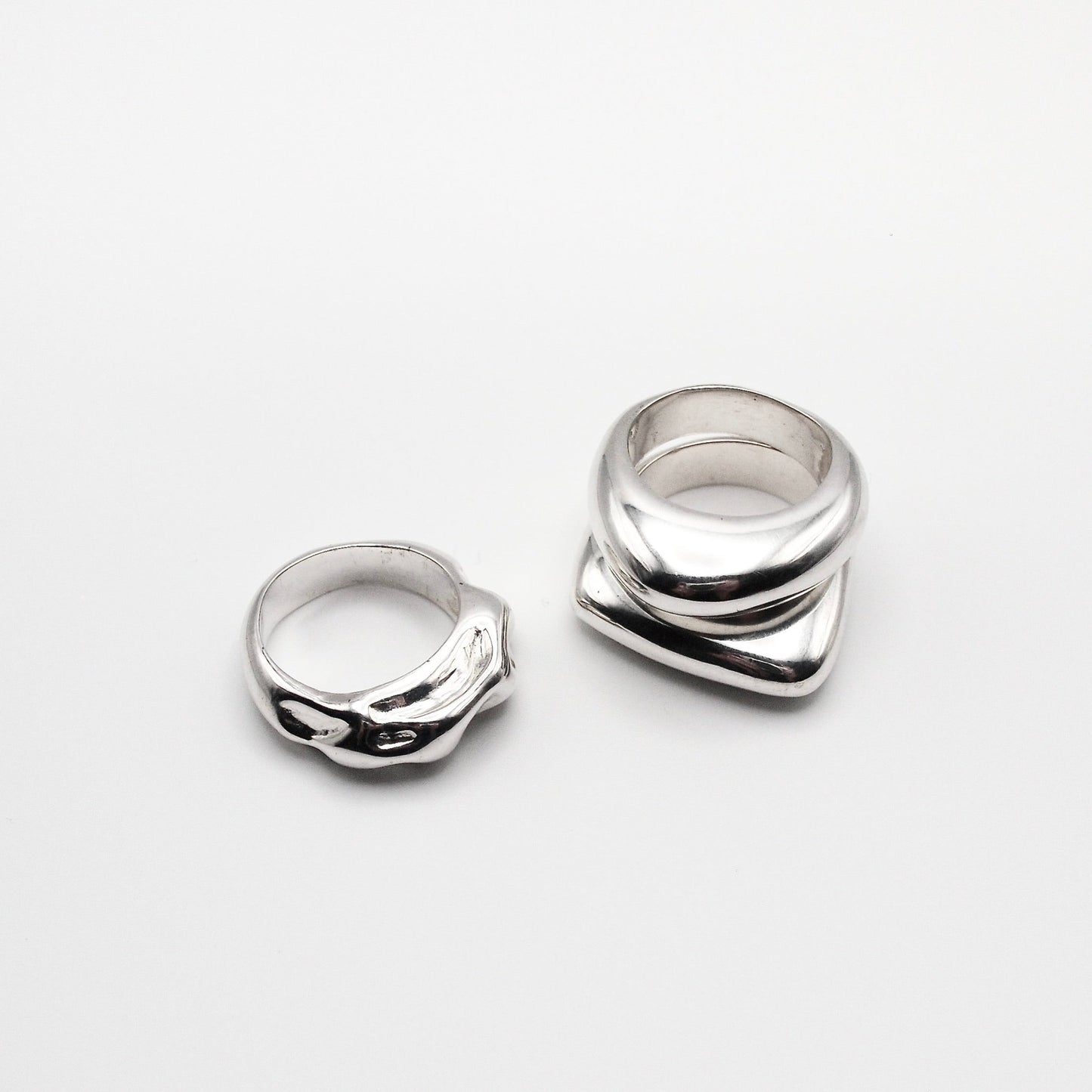 Astrid_ring_925_sterling_silver_simple_ring_organic_shape_ sister ring, model pouring water, stacking rings 
