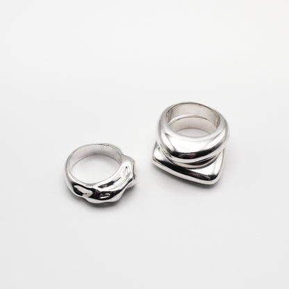 Astrid_ring_925_sterling_silver_simple_ring_organic_shape_ sister ring, model pouring water, stacking rings 
