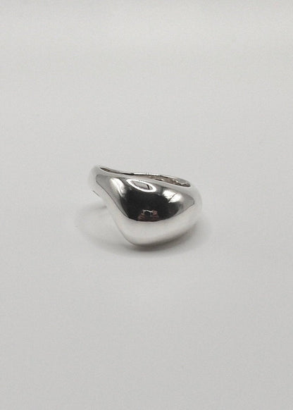 Detailed view of the Ingrid Ring, focusing on its intricate craftsmanship and the reflective quality of the 925 sterling silver.