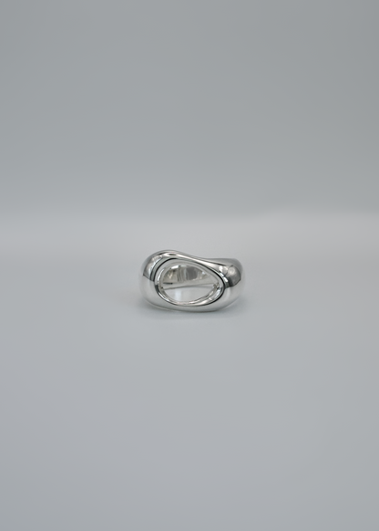 Silver ring on a gray background